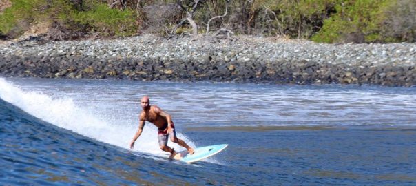 Eric enjoys one of the top 5 surf spots at Costa Rica.